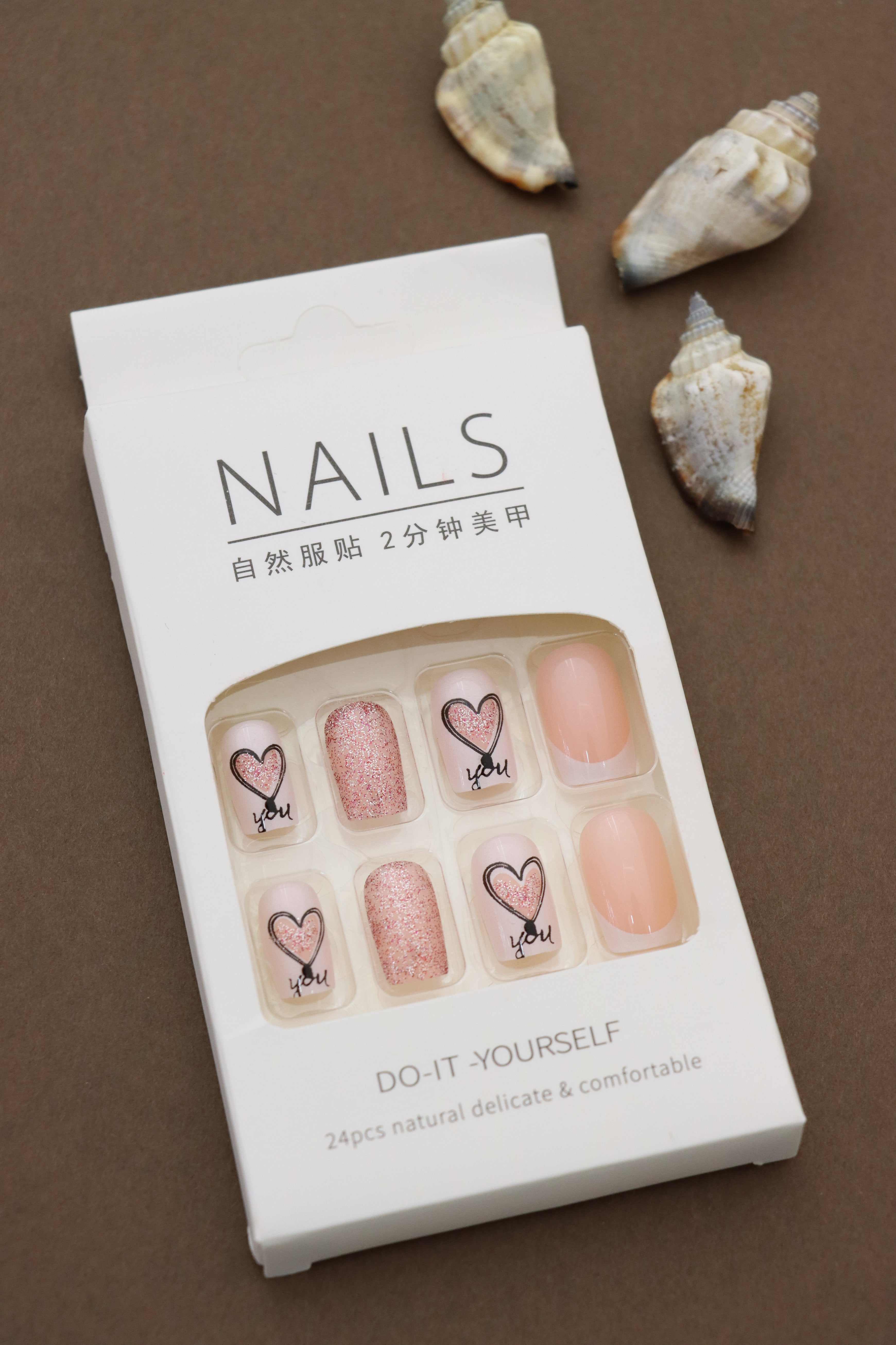 Adorable Love-Themed Nails: Sparkling Pink Glitter and Heart "You" Design. Perfect for Expressing Affection in Style. A Sweet Gesture for Any Occasion!