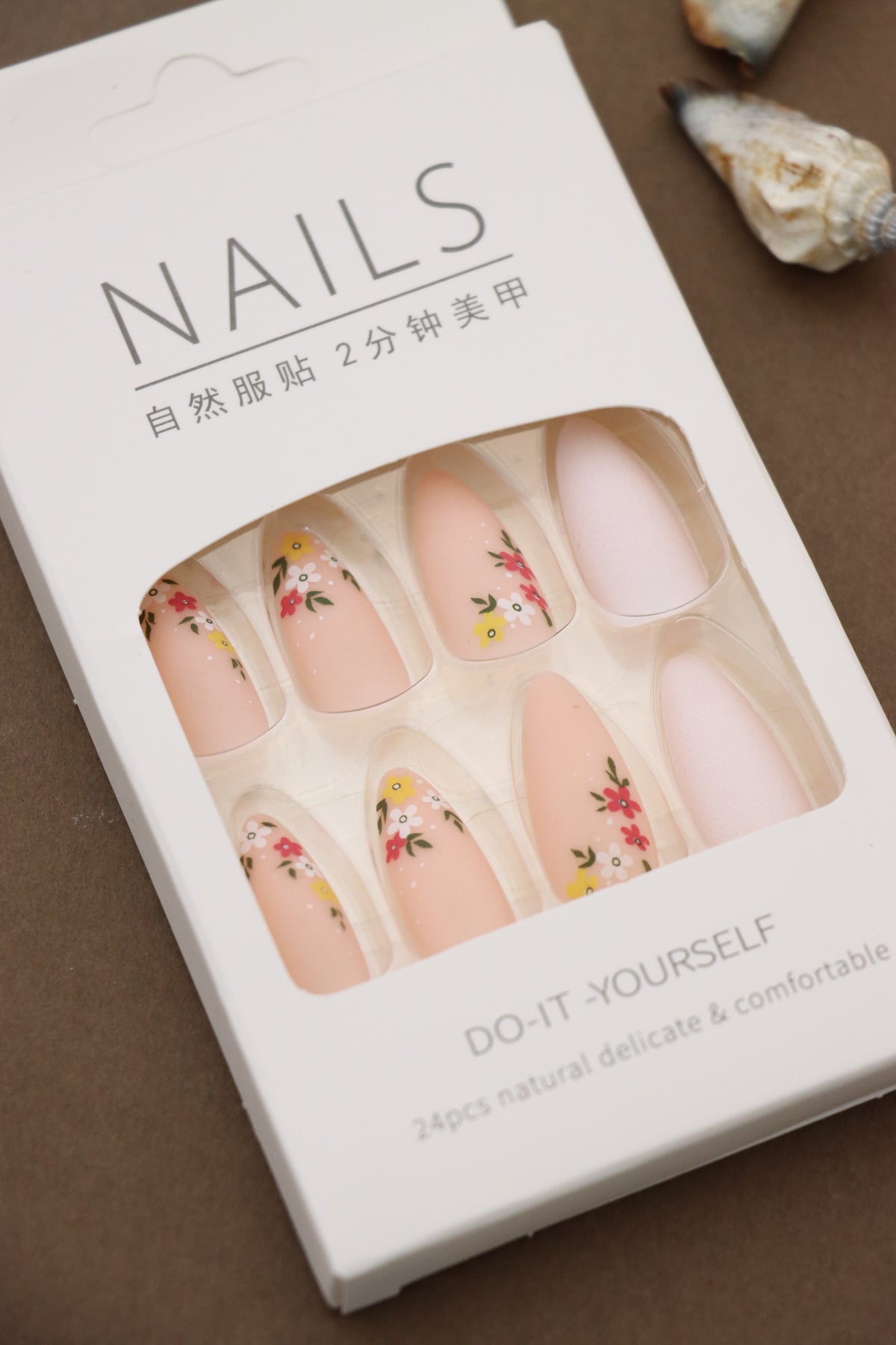 Chic Almond Nude Press-On Nails with Delicate Floral Print and White Accents - 24pcs Set