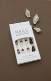 Black and Nude Almond Press-On Nails with Glitter and Chic Art Designs